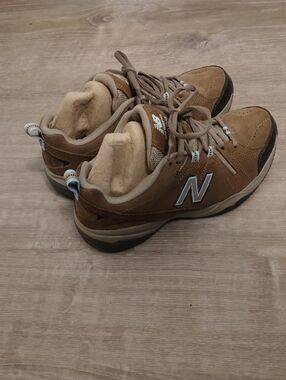 New Balance women hiking 608v4 Brown Suede Sneakers with Light Blue Logo Trim
